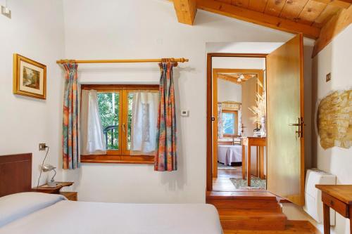 Postel nebo postele na pokoji v ubytování Al Ciod Agriturismo