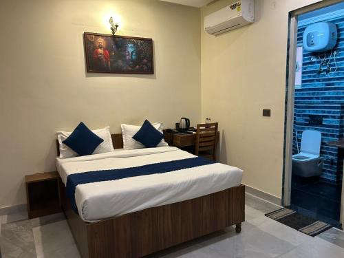 Ένα ή περισσότερα κρεβάτια σε δωμάτιο στο Hotel Future Inn and Banquet