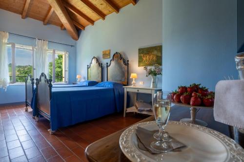 Ένα ή περισσότερα κρεβάτια σε δωμάτιο στο Agriturismo Casa Fonsi