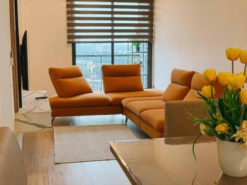Гостиная зона в Aston Acacia Luxe Retreat 7-8Pax with Free Netflix