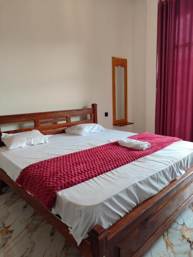 Postel nebo postele na pokoji v ubytování Sun Star Guest House