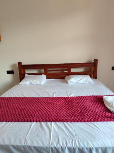 Postel nebo postele na pokoji v ubytování Sun Star Guest House