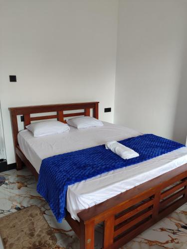 Postel nebo postele na pokoji v ubytování Sun Star Guest House