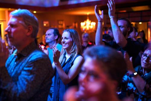a crowd of people dancing in a club at Trihotel Rostock - Wellnesshotel Adults Only in Rostock