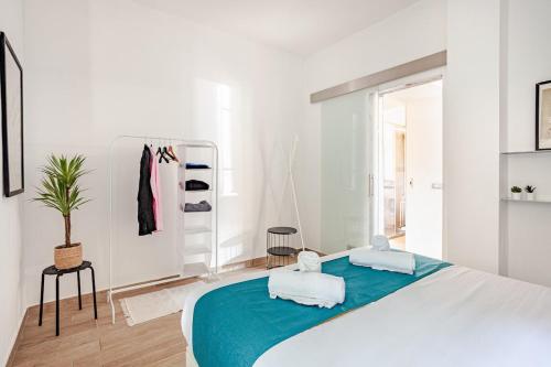 Ένα ή περισσότερα κρεβάτια σε δωμάτιο στο Appartamento Design - Vicino Centro Monza - Fast Wifi - Parcheggio