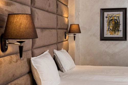 Ένα ή περισσότερα κρεβάτια σε δωμάτιο στο Grand Hotel Sveti Vlas-Ultra All Inclusive Fitness & SPA Hotel