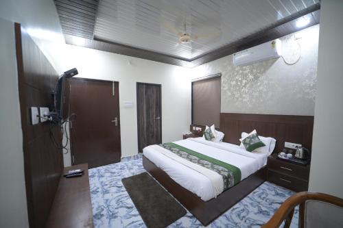 Ένα ή περισσότερα κρεβάτια σε δωμάτιο στο Shyam Shakti Villa