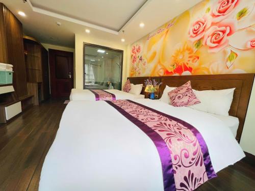 Ένα ή περισσότερα κρεβάτια σε δωμάτιο στο Sapa Lavender Hotel