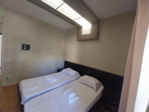 Cama o camas de una habitación en Danis Hotel