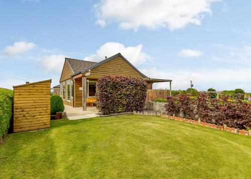 Κήπος έξω από το Durham Coastal Lodges