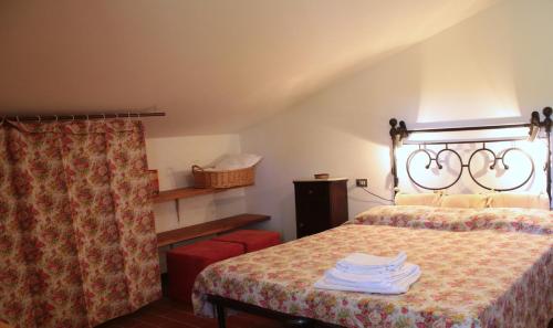 Ένα ή περισσότερα κρεβάτια σε δωμάτιο στο Agriturismo Il Cerrone