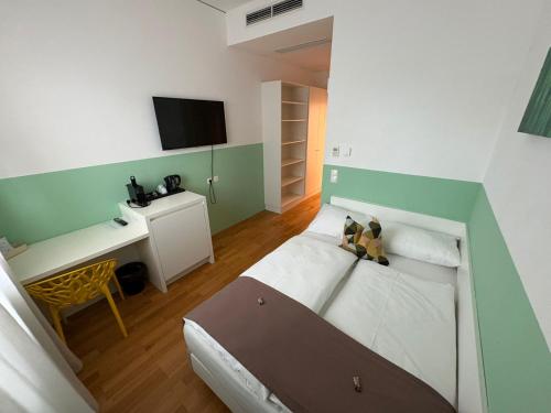 Cama o camas de una habitación en SHOME Hotel Graz I Self-Check-In I Free Parking
