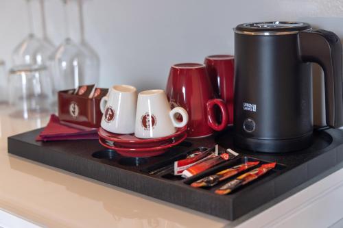 Set per la preparazione di tè e caffè presso Wellness Hotel Casa Barca (Adult Only)
