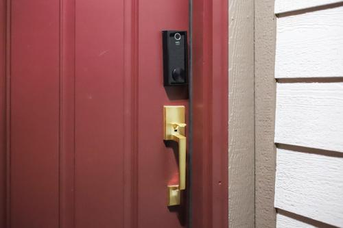 a red door with a gold door knob at Refined 6br Moose & Bear Lodge By Sweetheart Stay in Livingston