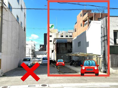 a picture of a street with a red x and a car at Tsukiji Hostel Wakayama 1 in Wakayama