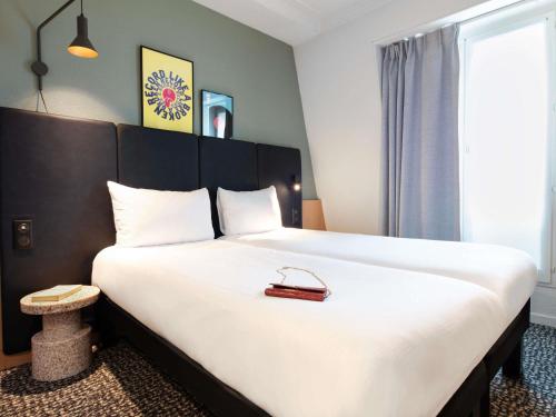 Katil atau katil-katil dalam bilik di ibis Paris Grands Boulevards Opéra 9e