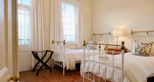 Ein Bett oder Betten in einem Zimmer der Unterkunft Karoo House Collection - 54 Middle