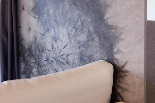 Letto o letti in una camera di Wellness Hotel Casa Barca (Adult Only)