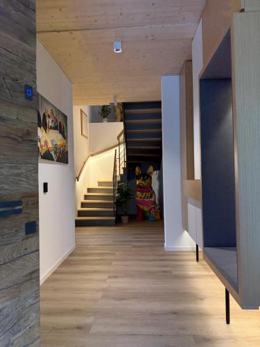 a hallway of a house with a staircase at Chalet NATURTRAUM in Runkel