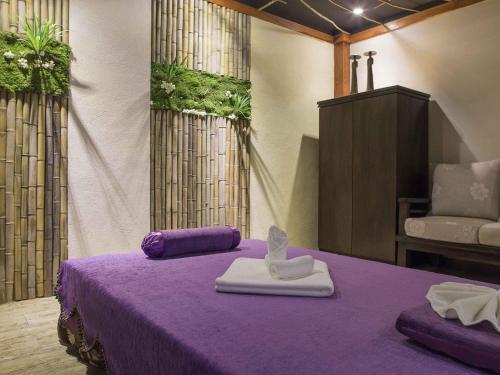 Letto o letti in una camera di Novotel Atlantis Shanghai - Enjoy our great-valued breakfast in our rooftop revolving restaurant with a stunning river view & utilize our FREE self-serviced laundry