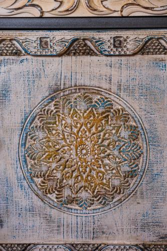 a close up of a design on a wooden wall at Cortijo Boutique Marbella in Marbella