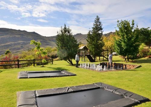 a group of people playing a game of trampoline at Piekenierskloof Mountain Resort by Dream Resorts in Citrusdal