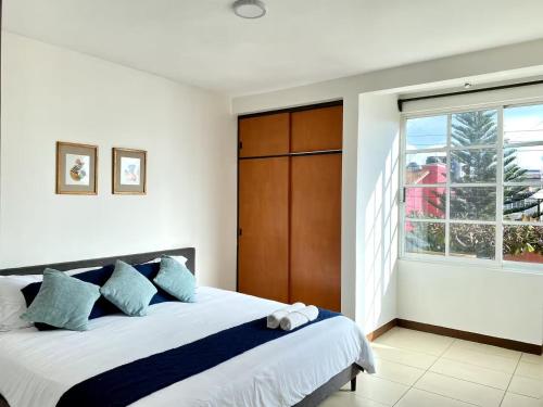 Ένα ή περισσότερα κρεβάτια σε δωμάτιο στο Family Size - 4BR House in Oaxaca - Peaceful