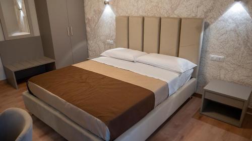 Un ou plusieurs lits dans un hébergement de l'établissement Ludey B&B Reggio Calabria