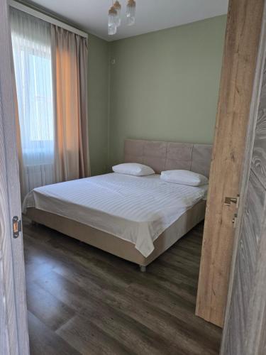 Postel nebo postele na pokoji v ubytování Apartament Proshyan
