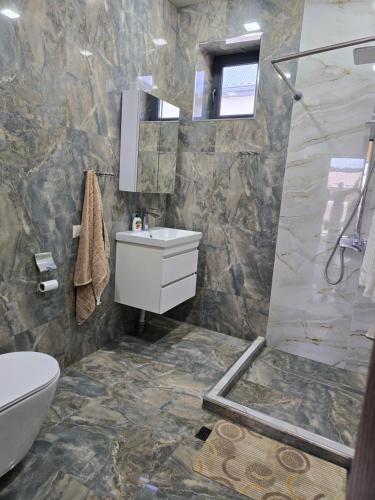 Koupelna v ubytování Apartament Proshyan