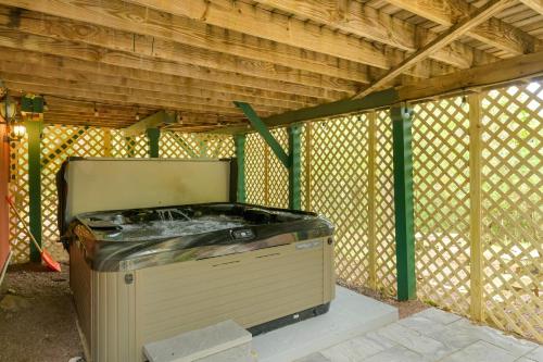 an inside of a house with a tub in it at Lake Harmony Getaway in Lake Harmony