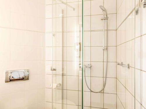 Ванная комната в Hotel Ibis Łódź Centrum