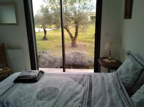 Ένα ή περισσότερα κρεβάτια σε δωμάτιο στο Villa Helychrisa