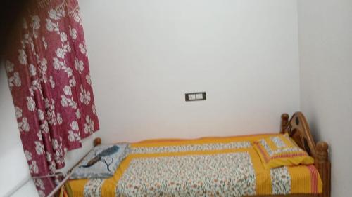 Katil atau katil-katil dalam bilik di Param Homestay