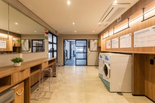 Una cocina o zona de cocina en Charlie Sabiá Moema