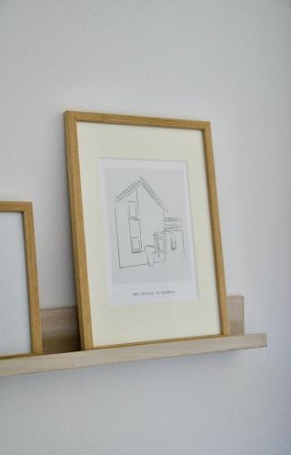 a picture of a house on a shelf at Mosselbank 93 - Noordzeepark Ouddorp, with private front and back garden near the beach - not for companies in Ouddorp