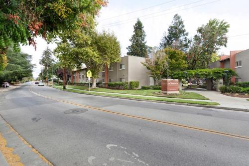 an empty street in a town with buildings at Blueground Campbell pool nr Campbell Park SFO-1889 in Campbell