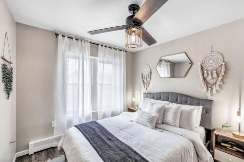 a bedroom with a bed and a ceiling fan at Across The Street From Von Stiehl-newly Renovated! in Algoma