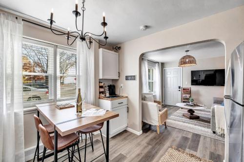 a kitchen and dining room with a table and chairs at Across The Street From Von Stiehl-newly Renovated! in Algoma