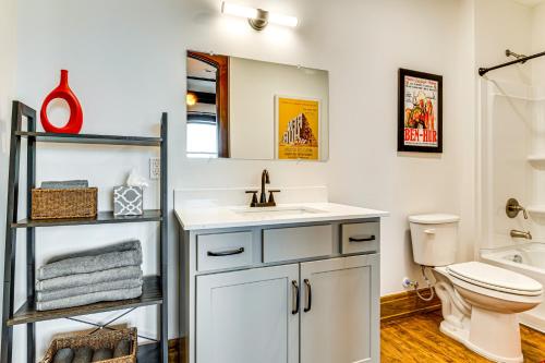 a bathroom with a sink and a toilet at Modern Elegance: Timeless Crawfordsville Studio! in Crawfordsville