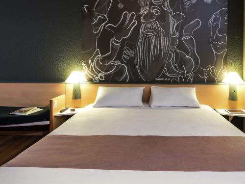 Cama o camas de una habitación en ibis Aalst