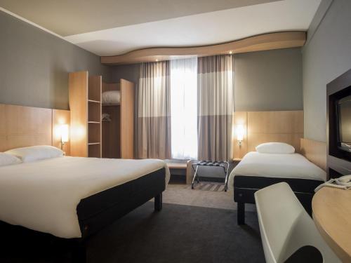Cama o camas de una habitación en ibis Hotel Brussels Centre Gare du Midi