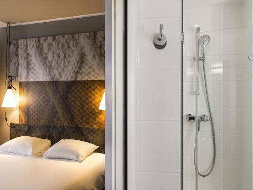 Cama o camas de una habitación en ibis Hotel Brussels Centre Gare du Midi