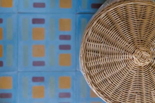 a close up of a wicker basket on a wall at Sumba Lodge in Manuel Antonio