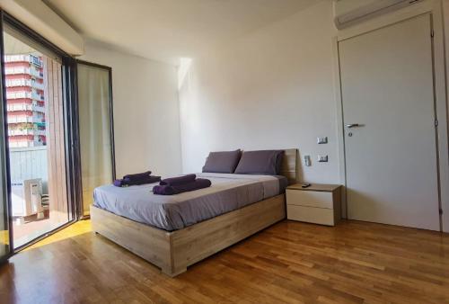 Giường trong phòng chung tại Davide Host Sesto Suite Apartment