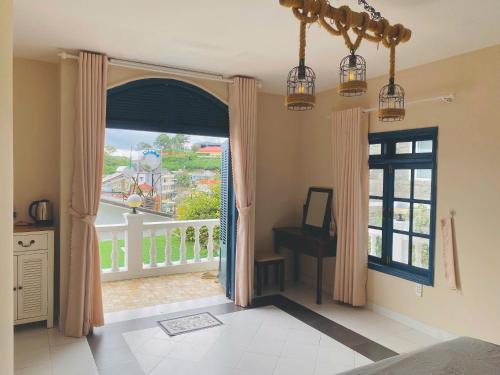 Postel nebo postele na pokoji v ubytování Nu Homestay Đà Lạt