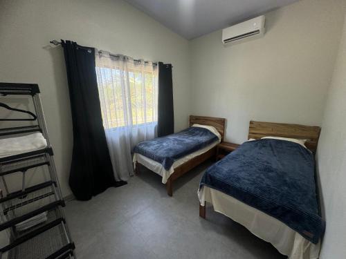 Postel nebo postele na pokoji v ubytování Vacation Villa in La Palma