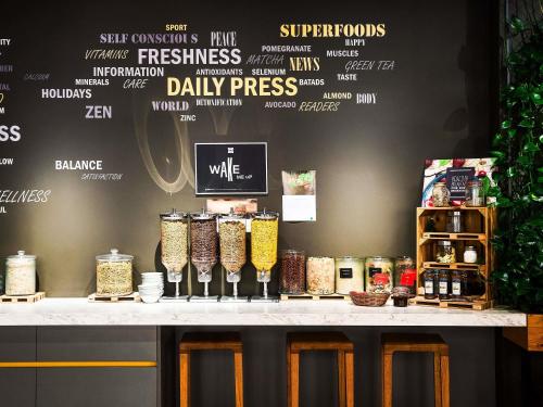a display of food items on a counter in a store at Ibis Praha Wenceslas Square in Prague