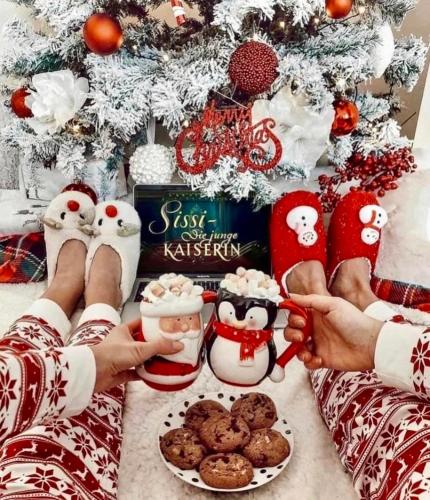 a group of people in pajamas standing in front of a christmas tree at Luxury Villa with Pool close to the Hungaroring in Kerepes