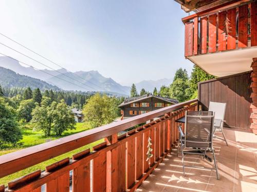 a balcony with a view of the mountains at Apartment Vermont 8 by Interhome in Villars-sur-Ollon